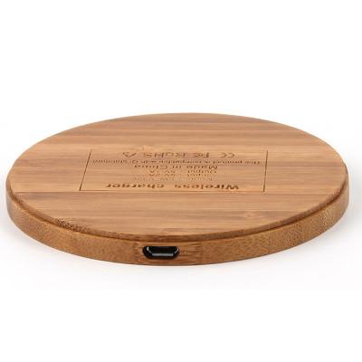 China Portable Universal Wooden Mobile Phone Qi Charger Wireless Pad for sale