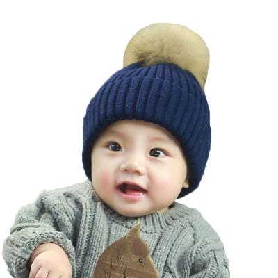 China Women Barred Pom Pom Beanie Hat Baby Warm Winter Acrylic 2021 Custom Knitted Hat for sale