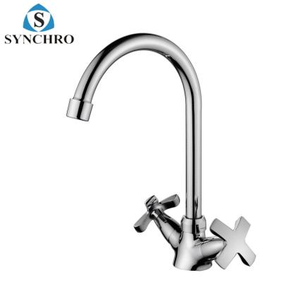 China Contemporary Brass Double Control Hand Kitchen Faucet For Sink With Swivel Spout for sale