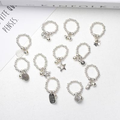 China Cute Smiling Female Couples Elastic Ring Fashion Pearl Transfer Love Hip-Hop DIY Elastic Ring for sale