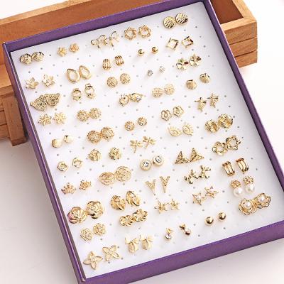 China Wholesale Cute 50 Pairs Korean Version Mixed Series Boxed Small Gold Earrings Shape Hollow Diamond Hypoallergenic Earrings for sale