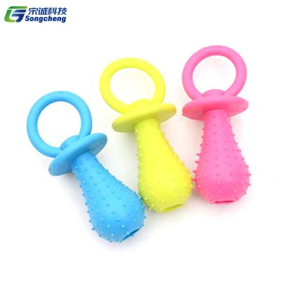 China Mini Pacifier Bite-Resistant Dog Toy Viable Non-Toxic Grinding Rubber Chew Pet Toys Random Color for sale