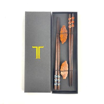 China Japanese Style Viable Wooden Chopsticks Flower Leaf Shape Classic Chopsticks Rest Art Craft Chopsticks Set With Case for sale