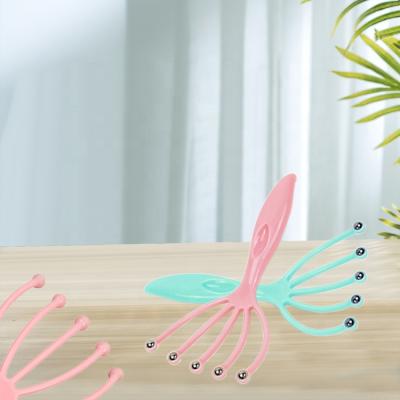 China Waterproof Five Claws Scrape Massage Claws Octopus Finger Gripper Household Head Massager Comb for sale