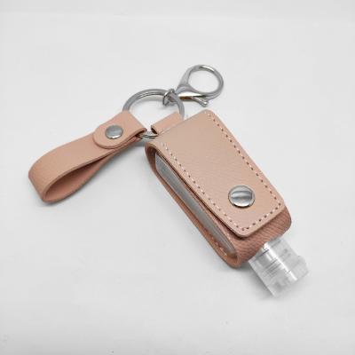 China Factory Price Key Chain Of Faux Hand Leather Cheap High Quality Glass Sanitizer Portable Holder for sale