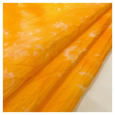 China Anti Pill Wholesale Bright Orange 100Nylon Printed Lightweight 35GSM 20D Tie dyeing Nylon Fabric for sale