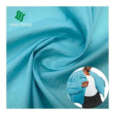 China Breathable upf 50 fabric Performance Run Jacket Fabric 20D*20D 100%nylon 38GSM outdoor fabric uv waterproof for sale