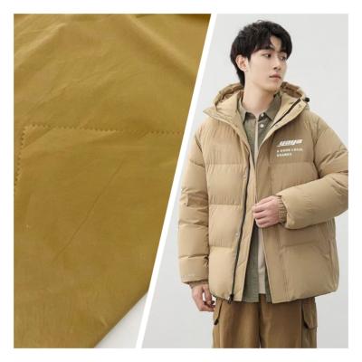 China Windproof Polyester Nylon soft waterproof down proof  brown cotton like top jacket fabric for sale