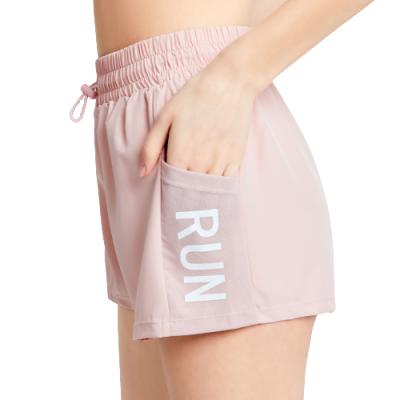 China Leisure Polyester Shorts Wholesale Fast Dye Workout High Waist Women Slimming Sports Running Shorts With Pocket Girls Custume Shorts for sale