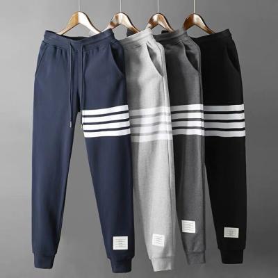 China Sports HOT DFG Polyester Cotton Sweatpants Pants Print Drawstring Sweatpants Men Pencil Pants Casual Mens Sweatpants Trousers for sale