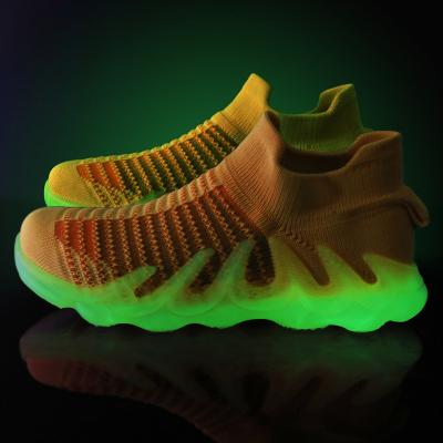 China Light Cool Boy Knitted Running Casual Sock Shoes Girl Bright Children Light Up Sneakers Kids Sports Shoes for sale