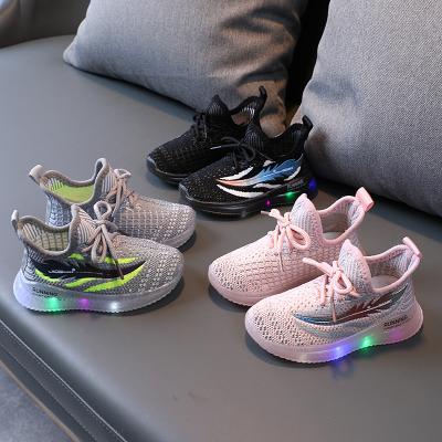 China Fashion Flat Boys Girls Breathable Knit Lighted Sneaker Kids Led Light Shoes Boys Kids Brand Shoes for sale