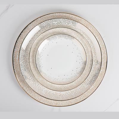 China Viable Luxury Royal White Gold Rim Porcelain Hotel Restaurant Hotel Dinner Plates Ceramic Dinnerware Sets for sale