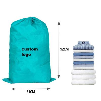 China Eco-friendly OEM extra large printed Rip-stop canvasTravel dirty clothes machine bulk washable nylon hotel laundry bag with drawstring for sale