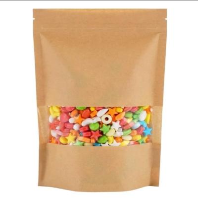 China Recyclable Wholesale Cheap Recycled Nuts Packaging Pouch Brown Kraft Paper Zipper Candy Bag With Clear Window for sale