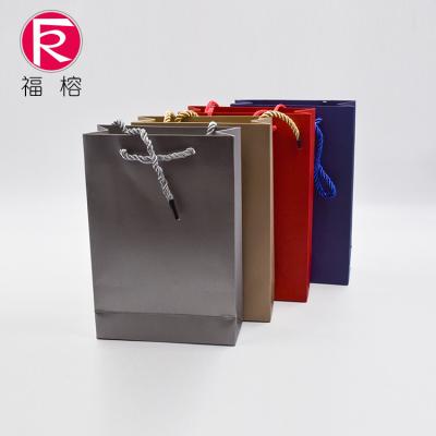 China Gift Packing Custom OEM ODM Travel Jewelry Bag Handheld Paper Jewelry Bag for sale