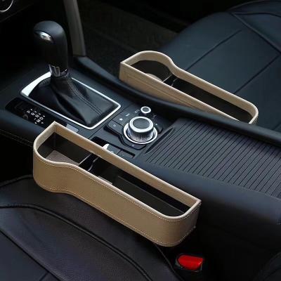 China All car seats ABS and beige PU car cup holder leather car seat storage box for sale