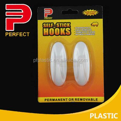 China Viable No Screws Adhesive Plastic White Wall Hooks Oval Hooks for sale