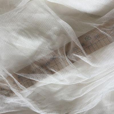 China Howmay 100% Tulle Fabric 30gsm 135cm Organic Pure Silk White Knitted Silk Sheer Soft Fabric For Wedding Dress Party Dress for sale