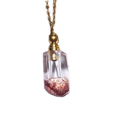 China China Natural Crystal Essence Oil Bottle Strawberry Quartz Perfume Bottle Pendant For Sale for sale