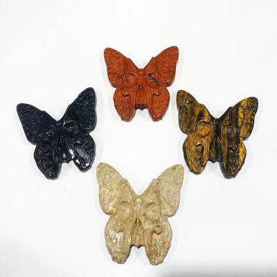 China Europe Natural Hand Polished Carving Crystal Skulls Butterfly Skulls Sculpture Crystal Animal For Decoration for sale