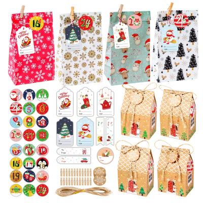 China Festival Gift 24pcs Christmas Wrapping Paper Gift Greeting Bags Set Christmas Prints Bags Medium DIY Candy Bags with Tissue Paper for Holiday Wrapping for sale