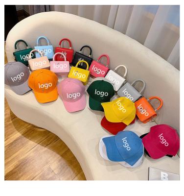 China 2021 famous brands fashion designer handbag custom rhinestone baseball cap hat set ny bags and purses for sale