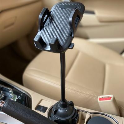 China Adjustable Adjust Base Suit To All Size Smartphone Double Side Suction Cup Mount Car Mobile Phone Holder Universal Phone Stand 3926909090 ABS for sale