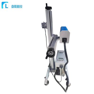 China Cheap Laser Marking Flying Laser Marking Machine CO2 Fiber Laser Marking Machine Jinan Laser Marking Machine Dinglong for sale