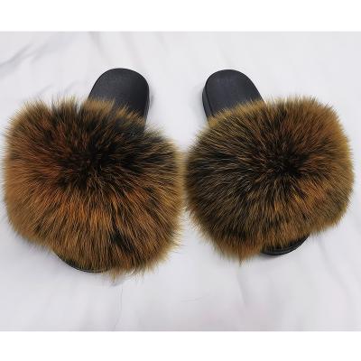 China Fashion trend logo pvc raccoon fur slippers indoor unique hairy sandal colorful fluffy 100% fluffy fox fur slipper for women for sale