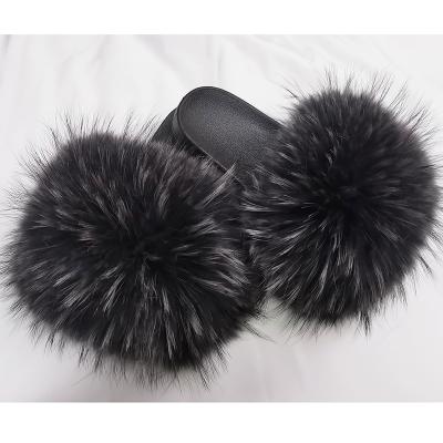 China Women's Fashion Trend Women's Raccoon Fur Sandals Natural Color Fur Slides Soft Wholesale Women's Slippers for sale