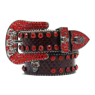 China Fashion.Casual Wide Belt Western Red Rhinestone Belt Skull Head Button Personalized Fashion Trend Baita Denim Belt Factory Direct Sales for sale