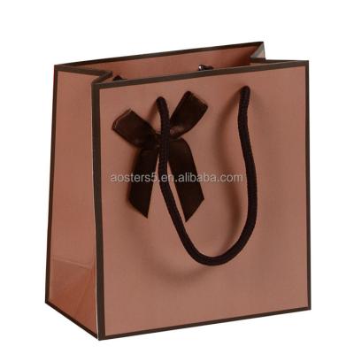 China Custom Recyclable Gold Logo Print Matte Black Rose Carry Paperbags Boutique Shopping Eco Gift Luxury Paper Bags With Handles Ribbon Bow Tie for sale