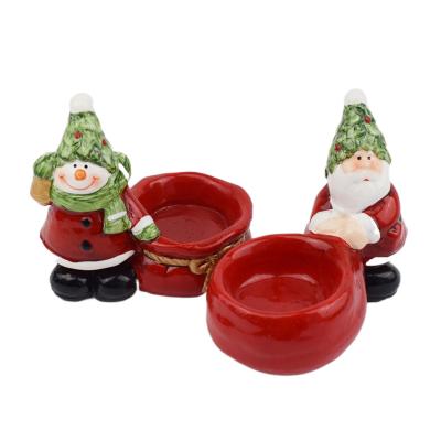 China New Christmas Elements Santa Claus Snowman Candlestick Candle Set Ceramic Decoration Crafts for sale