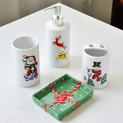 China New Sustainable Christmas Pattern Bathroom Tooth Mug Hand Sanitizer Cup White Ceramic Four-Piece Set for sale