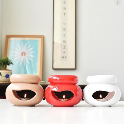 China Christmas Elements New Products Ceramic Aromatherapy Stove Cavity Essential Oil Stove Home Crafts for sale