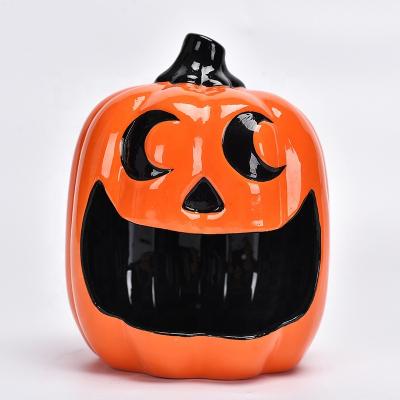 China New Product Customized Modern Ceramic Ornaments Halloween Pumpkin Modeling Candy Box Cookie Jar Holiday Decoration for sale