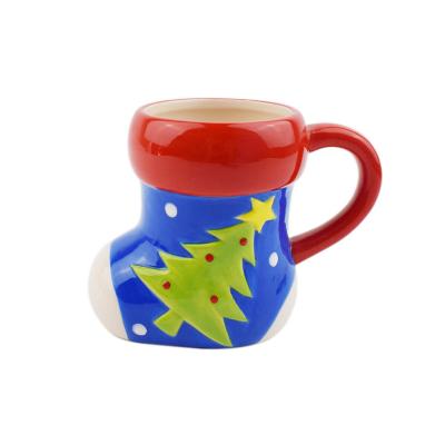 China European Christmas Porcelain Water Cup Sustainable Selling Good Hand Painted Christmas Socks Shape Cup for sale