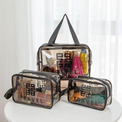 China Portable Clear Transparent Waterproof Travel PVC Cosmetic Bag Zipper Make Up Organizer Toiletry Bag With Handles for sale