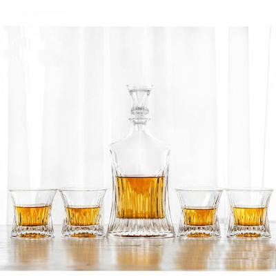 China Current Wholesale Unique Shape Crystal Fancy 700ml Wine Whiskey Bottle Whiskey Liquor Glass Decanter Set With 4 Glasses for sale