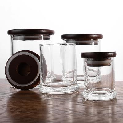 China Home Wholesale Hot Selling Transparent Clear Cylinder Decoration Candle Glass Jar With Wooden Flat Lid for sale