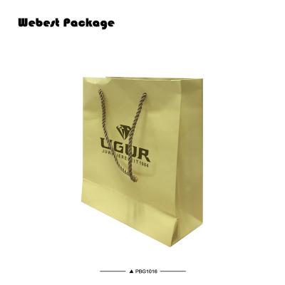 China Wholesale Yellow Luxury Glossy Paper Bag Gift Webest Security Lamination Custom Logo for sale