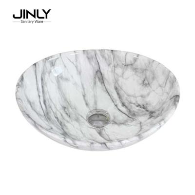 China Modern Italian Carrara Natural Stone Art Bathroom Basin Ceramic Sink , Ceramic Bathroom Vessel Sink White Marble Wash Basins Bathroom for sale