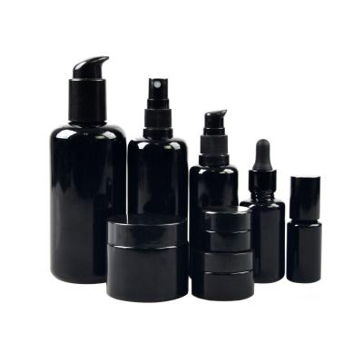 China Empty Personal Care 30ml 50ml 100ml 200ml 30g 50g Glass Eye Cream Black UV Purple Jar And Bottle With Dropper Pump For Cosmetic Packaging for sale