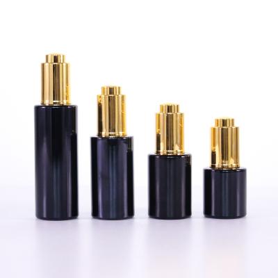 China Wholesale cosmetic 20ml 30ml 40ml 60ml in stock shoulder glass opaque black flat bottle with gold dropper made by automatic machine for sale