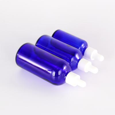 China New Design Trendy Cobalt Blue Personal Care Essential Oil Packaging Container Cosmetic Dropper Bottle With White Plastic Dropper for sale