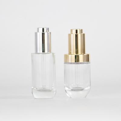 China High Quality Recyclable Glass Essential Oil Bottle With Sliver Or Press Dropper Gold Pump for sale