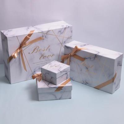 China Handmade Logo Holiday Custom Gift Cardboard Packaging Box Pink Marble Rigid Gift Box With Ribbon for sale