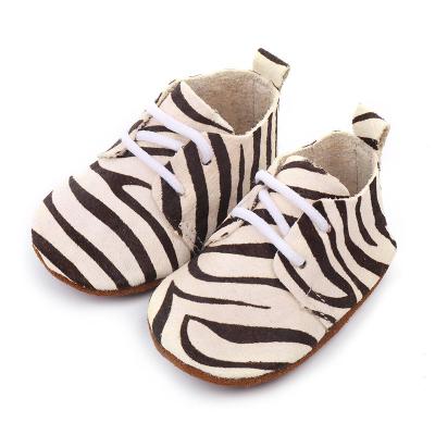 China ARCH SUPPORT New Arrival Genuine Leather Baby Iphone Shoes Zebra Winter Baby Unisex Leather Boots for sale