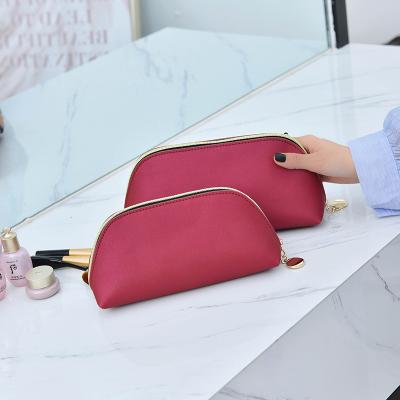 China 2021 New Fashion Durable Custom Shell Logo PU Cosmetic Organizer Bag For Travel Toiletry Pouch Beauty Bag for sale